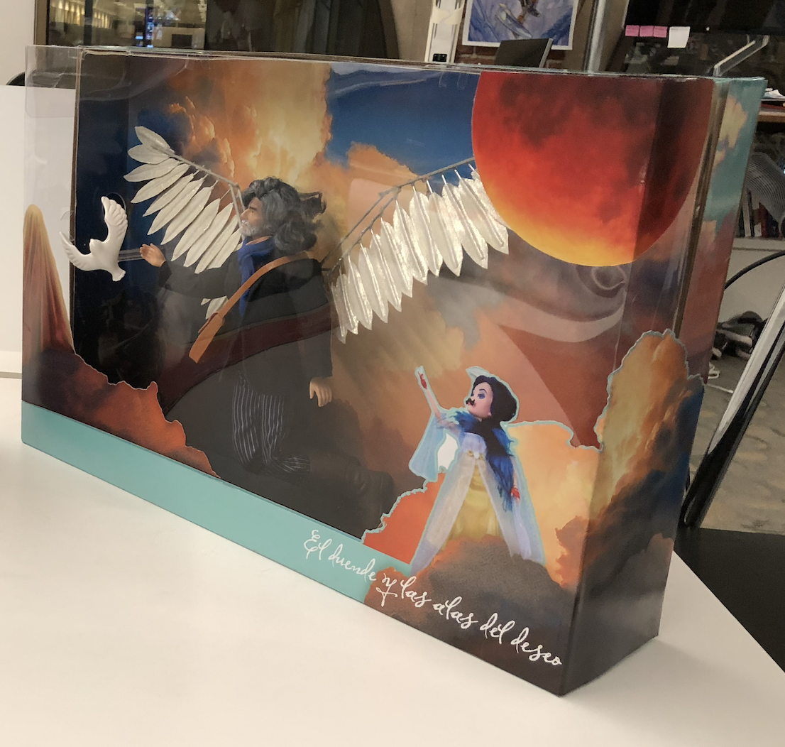 A boxed custom 12-inch winged superhero action figure